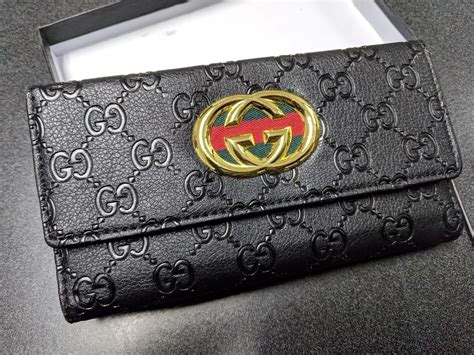 simple black and gold gucci wallet|black Gucci wallet women's.